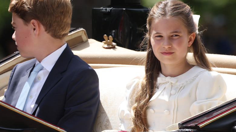 Princess Charlotte and Prince George in a carriage