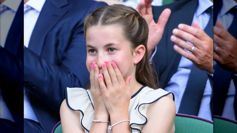 Princess Charlotte sits to watch a final match at Wimbledon 2025
