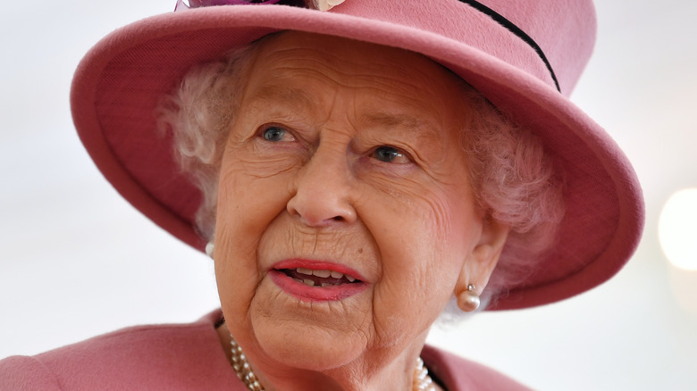 Queen Elizabeth with a horse 