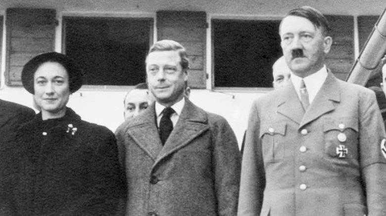 King Edward VIII and Wallis Simpson pose for a photograph with Adolf Hitler