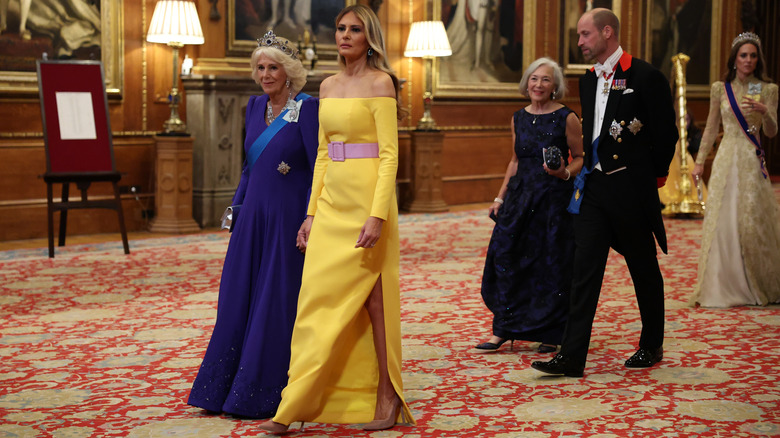 Queen Camilla and Melania Trump arrive at the banquet for Donald Trump's state visit