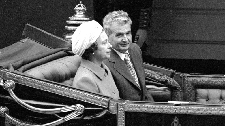 Queen Elizabeth II with Nicolae Ceaușescu in a carriage