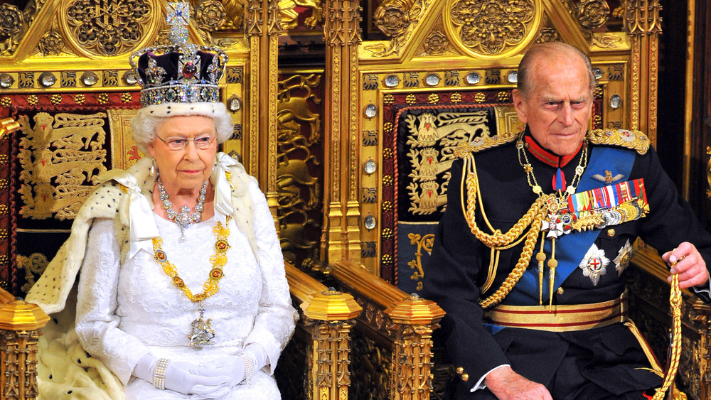 Queen Elizabeth and Prince Philip on their thrones