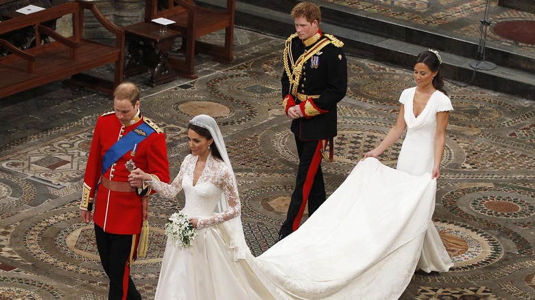 Prince Harry walking beside William and Kate at their 2011 wedding
