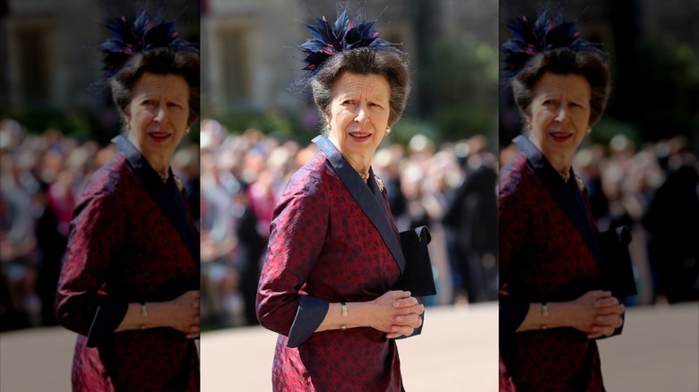 Princess Anne with her hands clasped over her stomach at Harry and Meghan's wedding