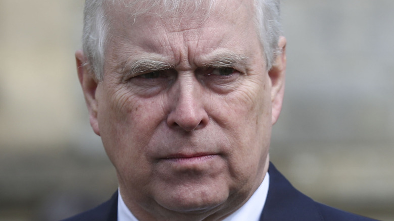 Prince Andrew looking grim