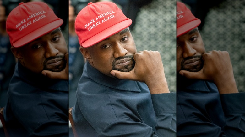 Kanye West wearing a Make America Great Again hat
