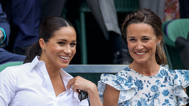 Meghan Markle Pippa Middleton smiling