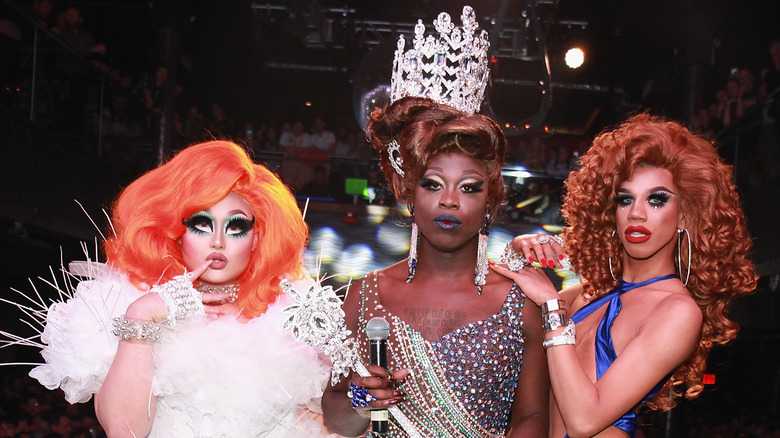 The stars of RuPaul's Drag Race pose together at an event