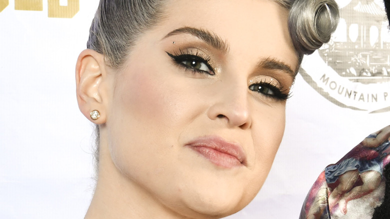 Kelly Osbourne smiling