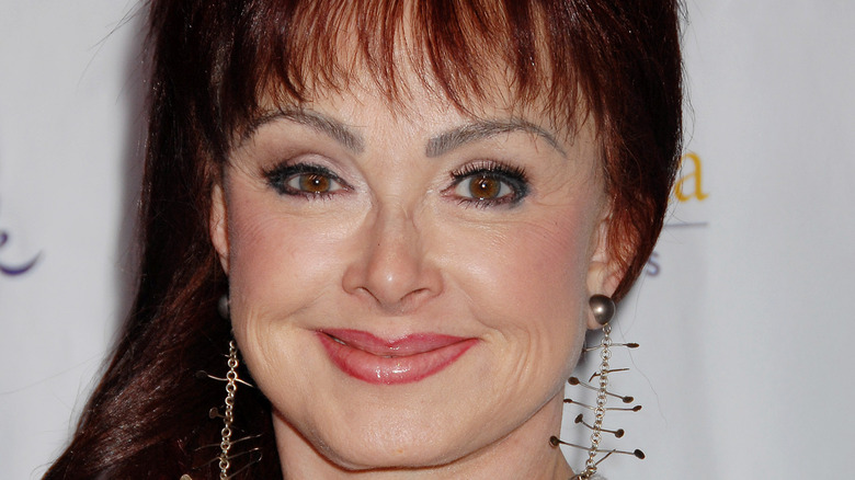 Naomi Judd smiling for photo 