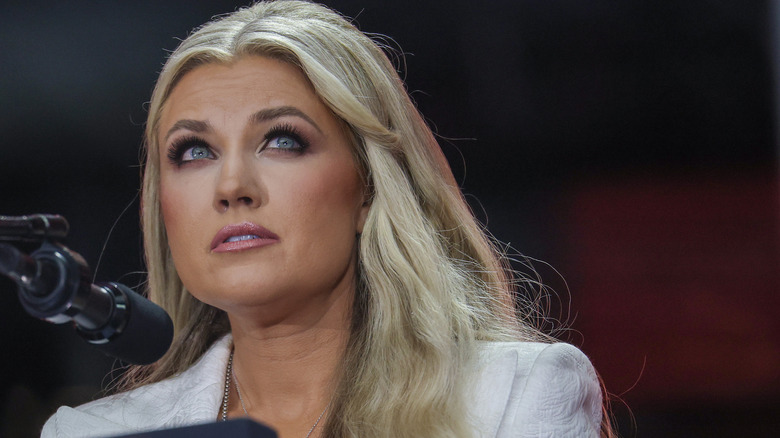 Erika Kirk speaking into a microphone