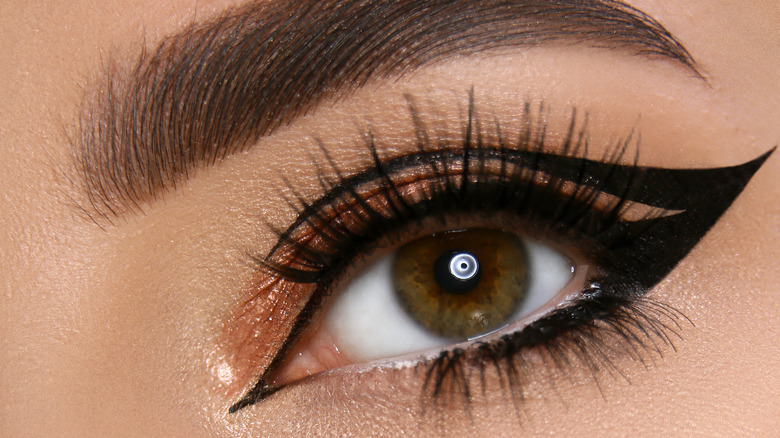 close up of a woman with dramatic eyeliner 