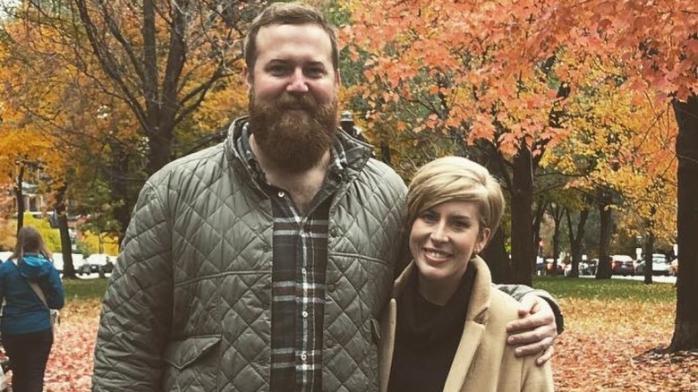 Erin and Ben pose on a autumn day 