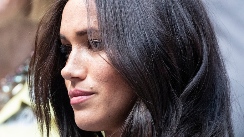 Meghan Markle looking to her right 