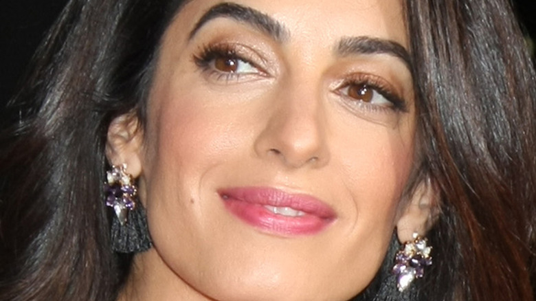 Closeup of Amal Clooney smiling.