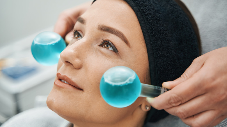 Woman using ice globes