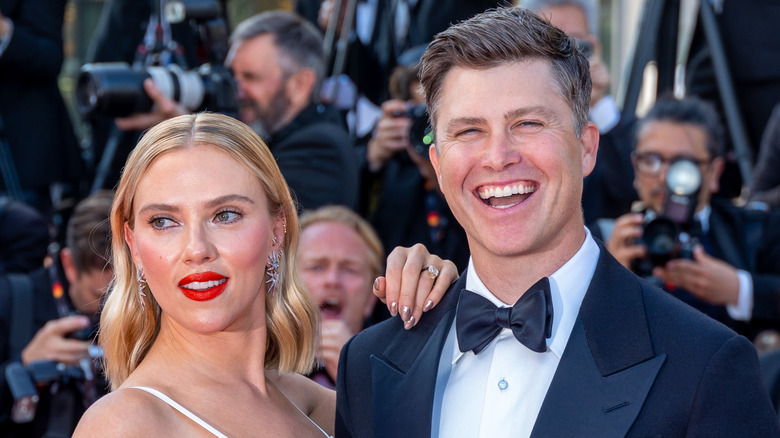 Scarlett Johansson and Colin Jost posing 