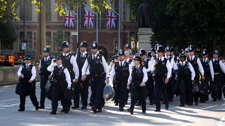 Police in London for the Queen lying in state