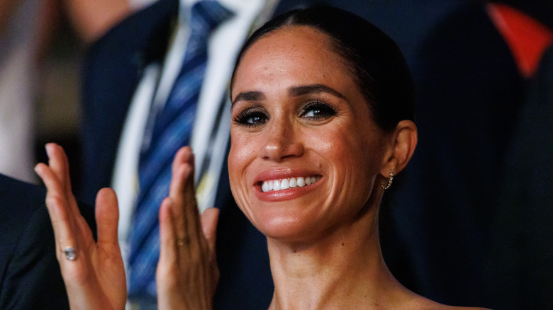 Meghan Markle clapping her hands 