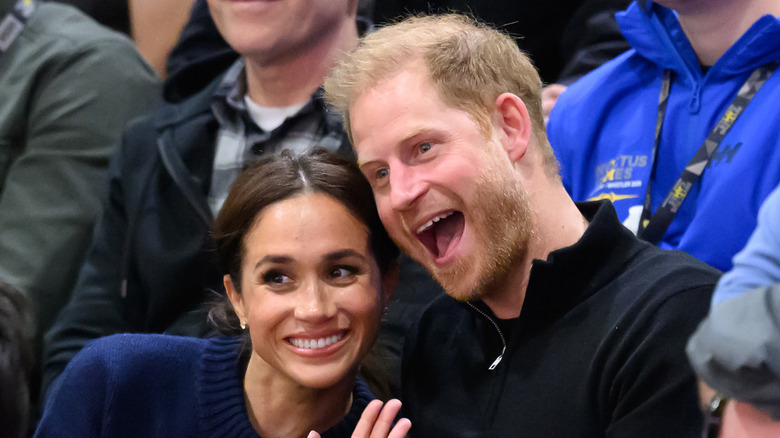 Meghan Markle and Prince Harry laughing at the Inv