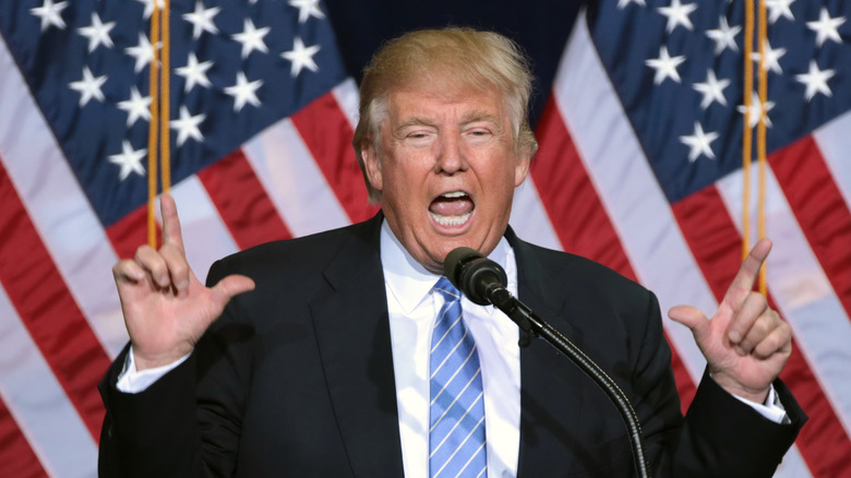 Donald Trump pointing with both hands during a speech in March 2016