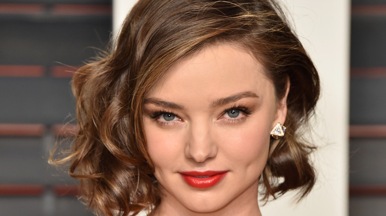 Miranda Kerr poses on the red carpet
