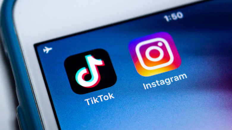 TikTok and Instagram apps on phone screen