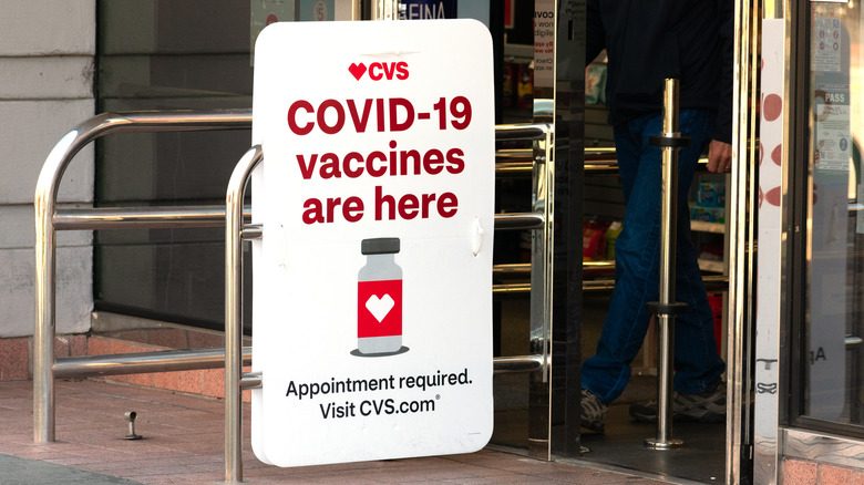 sign advertising COVID vaccines at CVS 