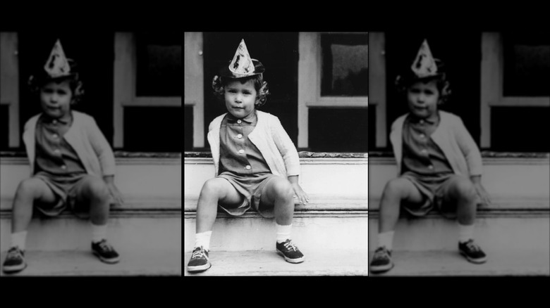 Pauline Robinson "Robin" Bush posing on the steps (1953)