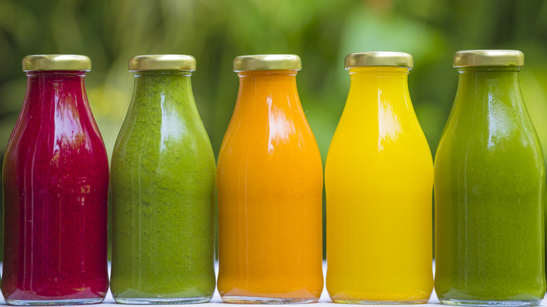 vegetable juices in glass bottles