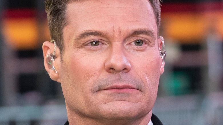 Ryan Seacrest looking serious