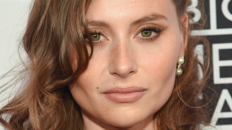 Aly Michalka poses on the red carpet