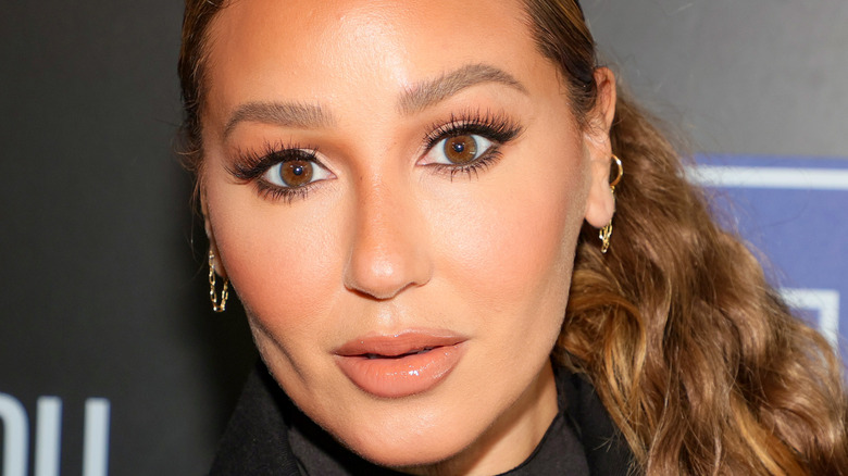 Adrienne Bailon poses for theh camera