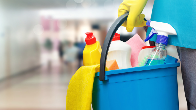 Cleaning products in a bucket