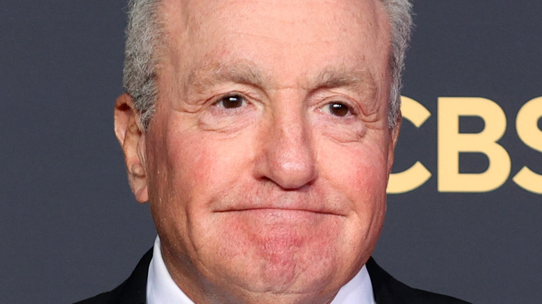 Lorne Michaels holding award