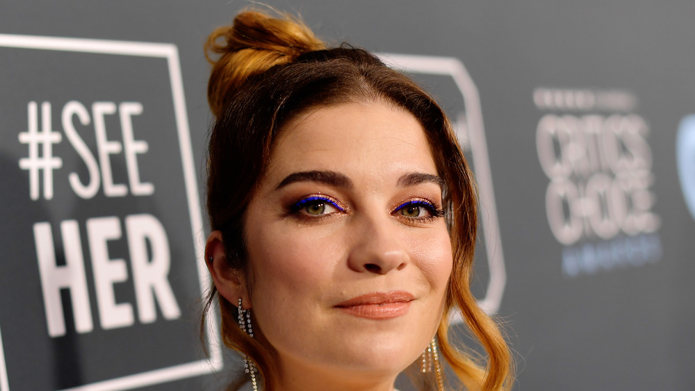 Annie Murphy poses on the red carpet