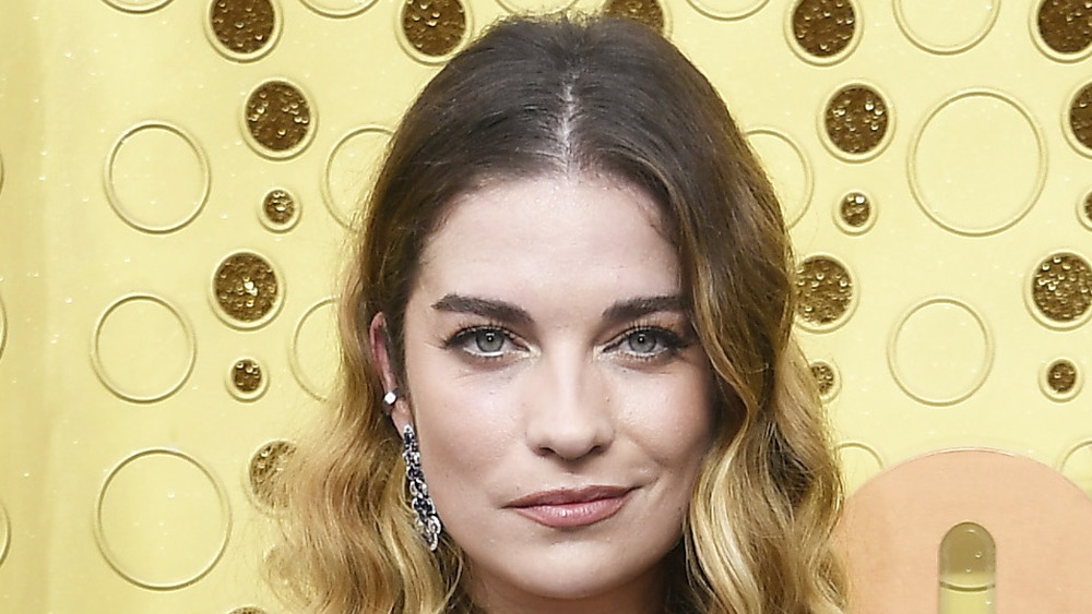 Annie Murphy poses on the red carpet