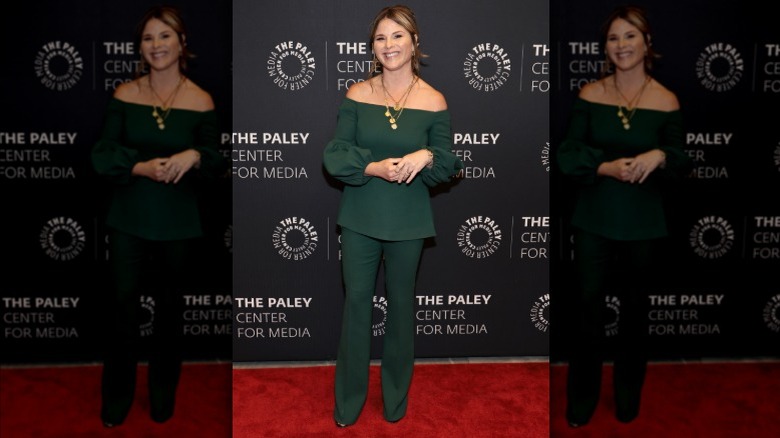 Jenna Bush smiling in a forest green outfit on the Paley Center red carpet (2022)