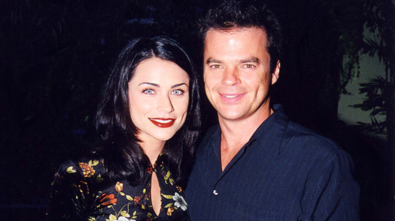 Rena Sofer and Wally Kurth smiling