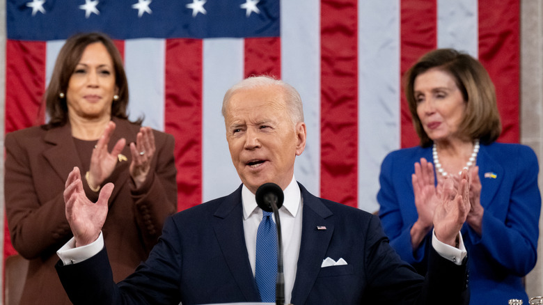 Kamala Harris and Nancy Pelosi clapping for Biden