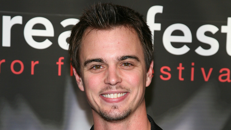 Darin Brooks posing at event