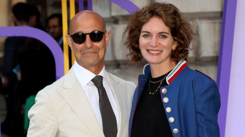 Stanley Tucci and Felicity Blunt smiling