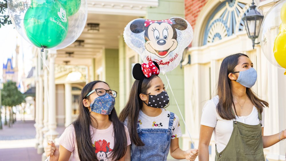 Disney World guests with face masks