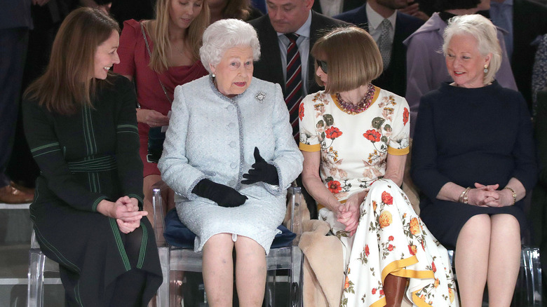 Queen Elizabeth speaking with Anna Wintour