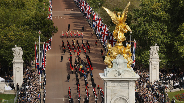 Crowd gathers during Queen Elizabeth II's funeral procession