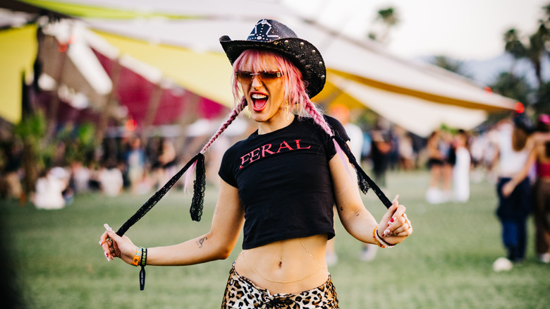 Woman wearing cowboy hat