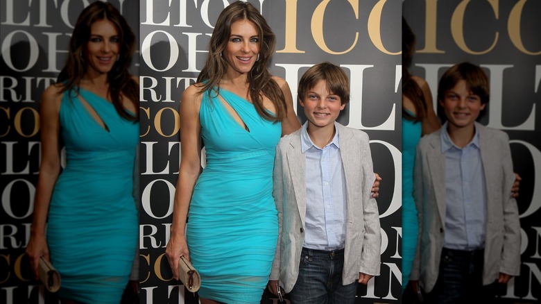 Elizabeth Hurley posing with her arm around Damian Hurley.