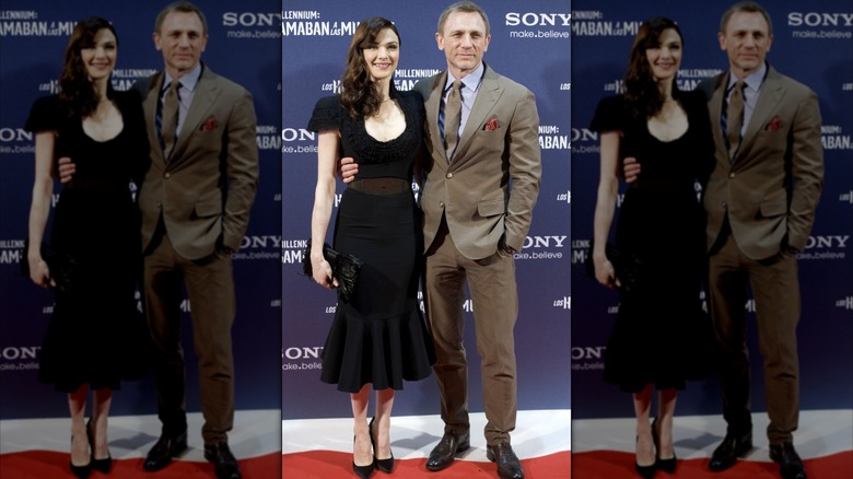 Rachel Weisz in a black dress and Daniel Craig attend an event together