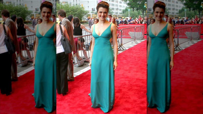 Rachel Weisz in a turquoise gown on a red carpet in New York